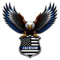 Police metal sign featuring a bald eagle with spread wings above a thin blue line American flag shield