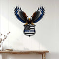 Police eagle metal sign displayed on a white paneled wall above a console table