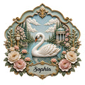 Ornate swan metal sign featuring a white swan on a garden lake with flowers, trees, and a classical pavilion