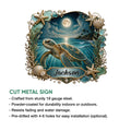 Sea turtle cut metal sign displayed with an ocean-at-night design and decorative coastal border