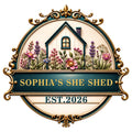 Ornate custom She Shed metal sign featuring a cottage surrounded by colorful flowers