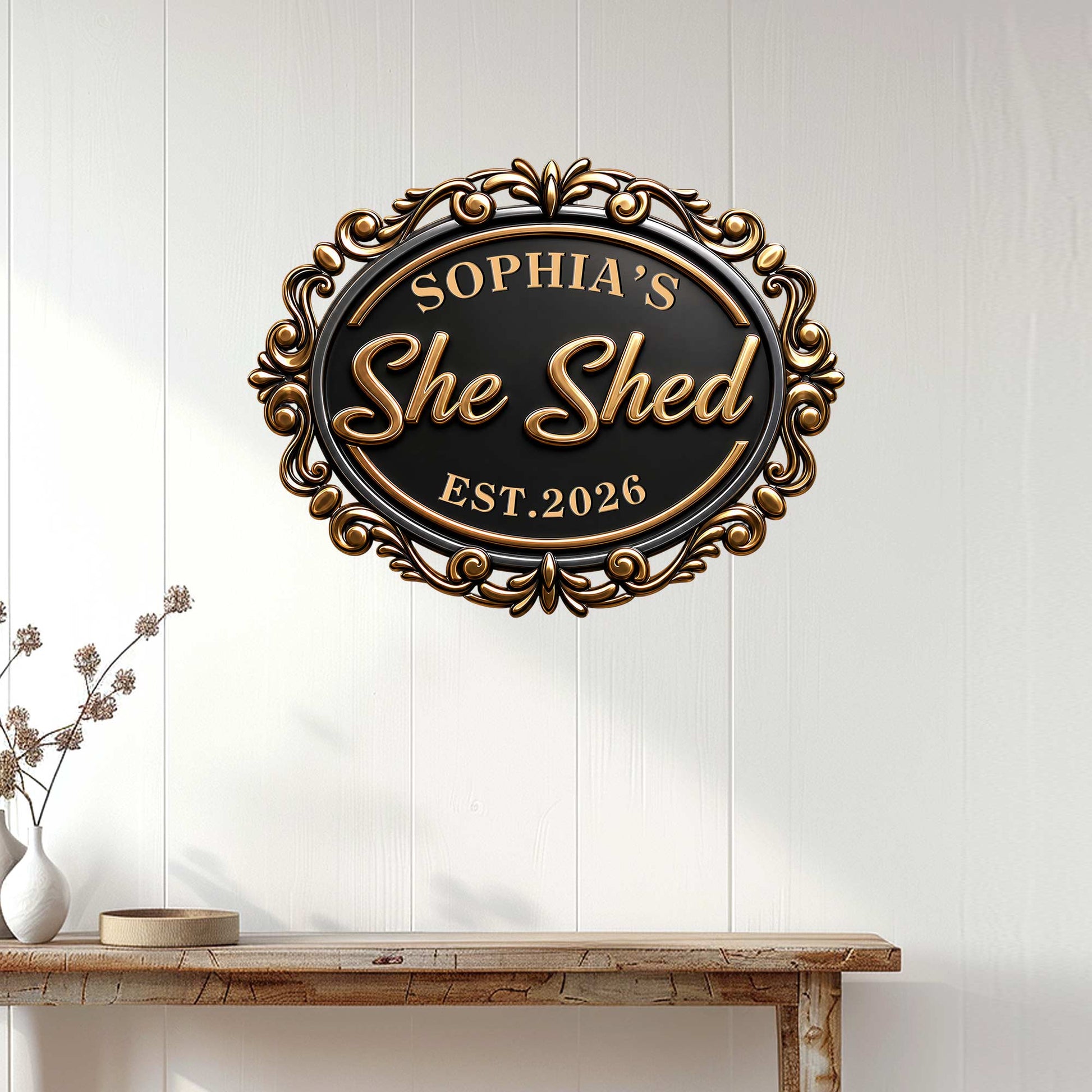 She Shed metal sign displayed on a white paneled wall above a console table