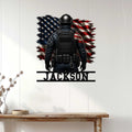 Police officer metal wall decor displayed on a light wood wall above a console table