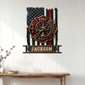 Fire department metal wall sign displayed on a white paneled wall above a console table