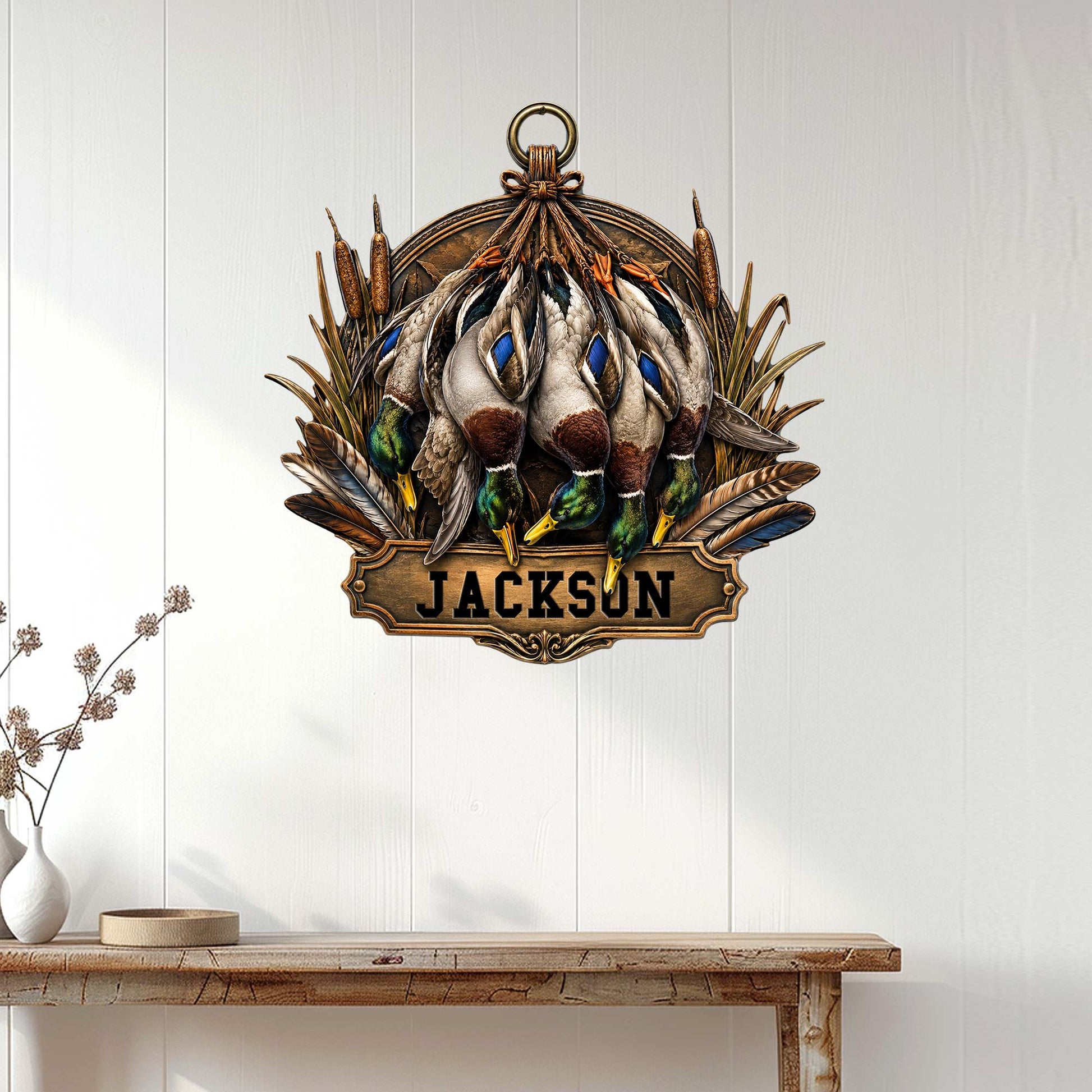 Duck hunting metal wall sign displayed on white paneled decor above a rustic console table