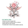 Cut metal nurse sign with a rose, wings, medical symbol, and ribbon-style central design