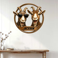 Goat wall decor displayed above a console table, featuring two expressive goats in a circular metal sign design