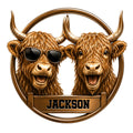 Highland Cow metal sign featuring two smiling shaggy cows, one wearing sunglasses, in a bronze circular frame
