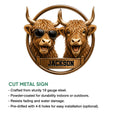 Highland Cow cut metal sign showing a playful pair of shaggy cattle in a circular bronze design