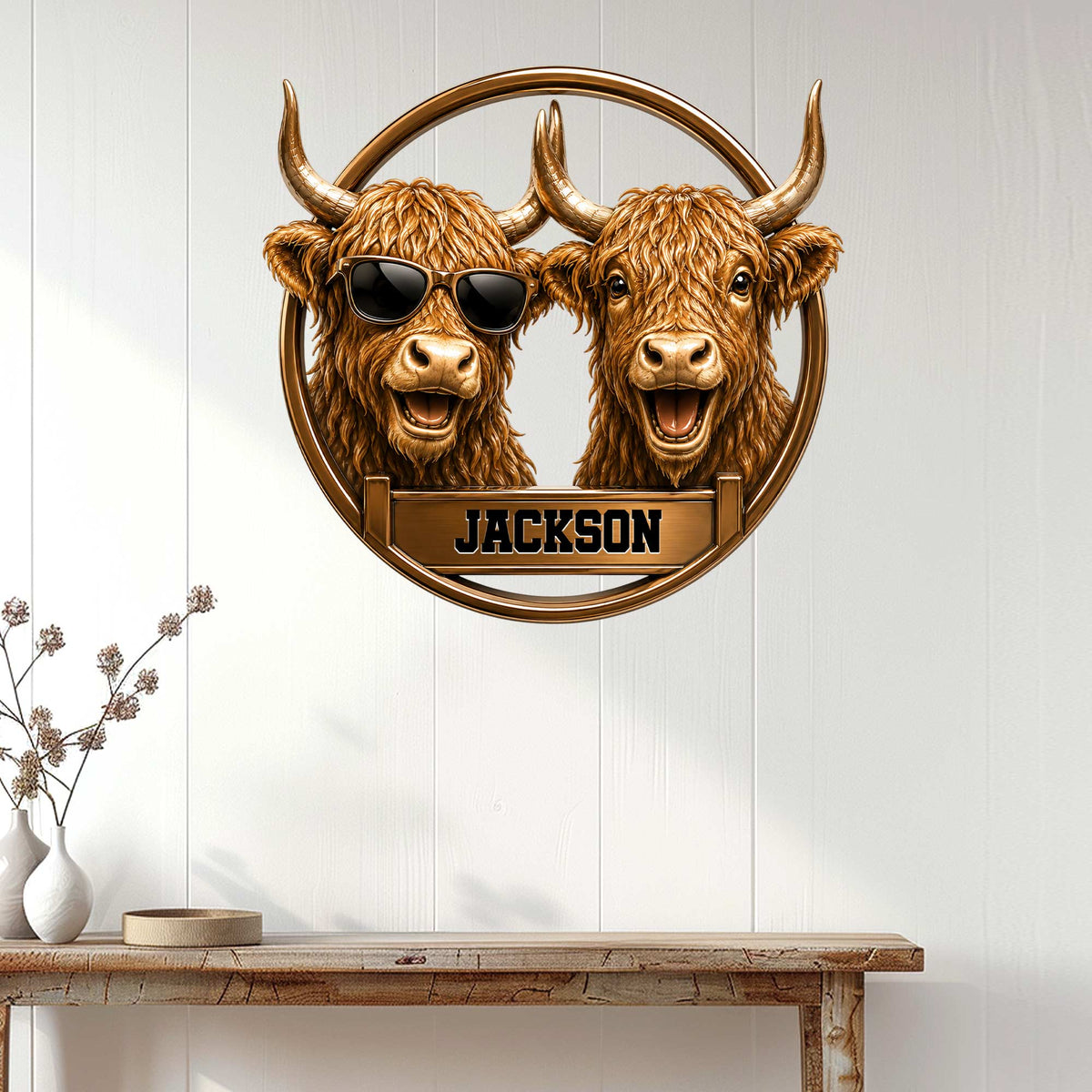 Highland Cow wall decor displayed on a white paneled wall above a rustic wood console table