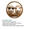 Sheep metal sign product feature showing two playful sheep and a bold framed design for farm decor