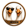 Custom duck metal sign featuring a funny pair of white ducks, sunglasses, and a circular bronze-style frame