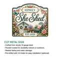 She Shed metal sign shown with a cut-metal construction feature guide and detailed cottage garden artwork