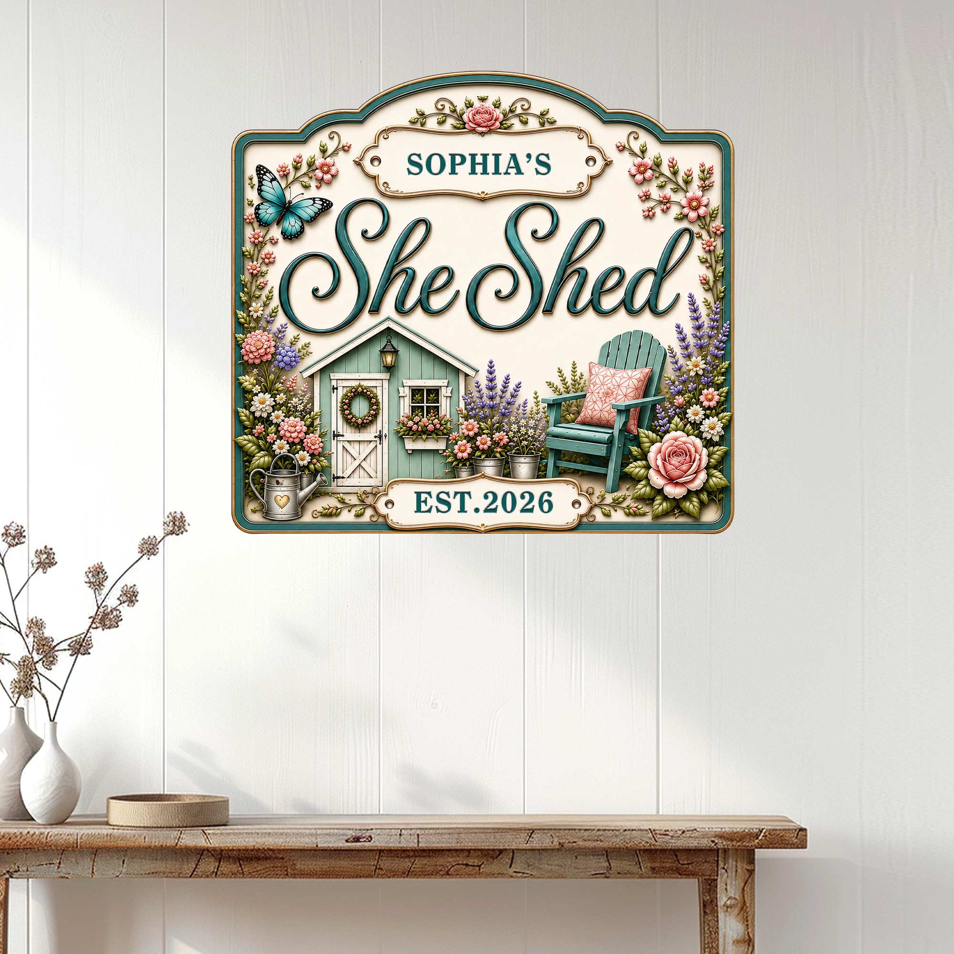 Decorative She Shed metal sign displayed on a white paneled wall above a rustic console table