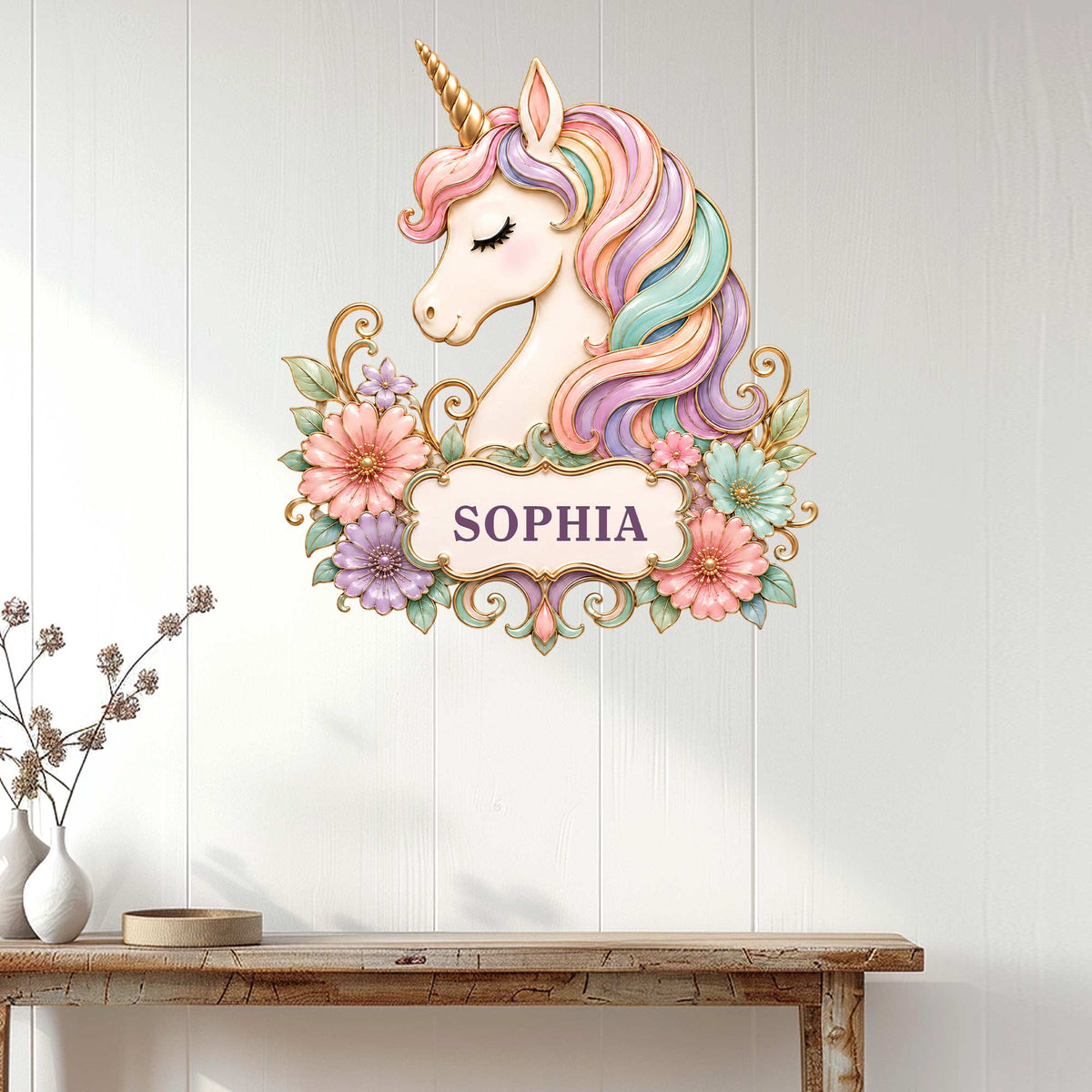Floral unicorn metal wall sign displayed on a light wood wall above a console table