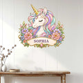 Pastel unicorn wall sign displayed above a console table in a bright home interior