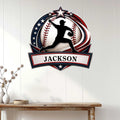 Baseball player silhouette metal sign displayed as wall decor above a console table in a bright home