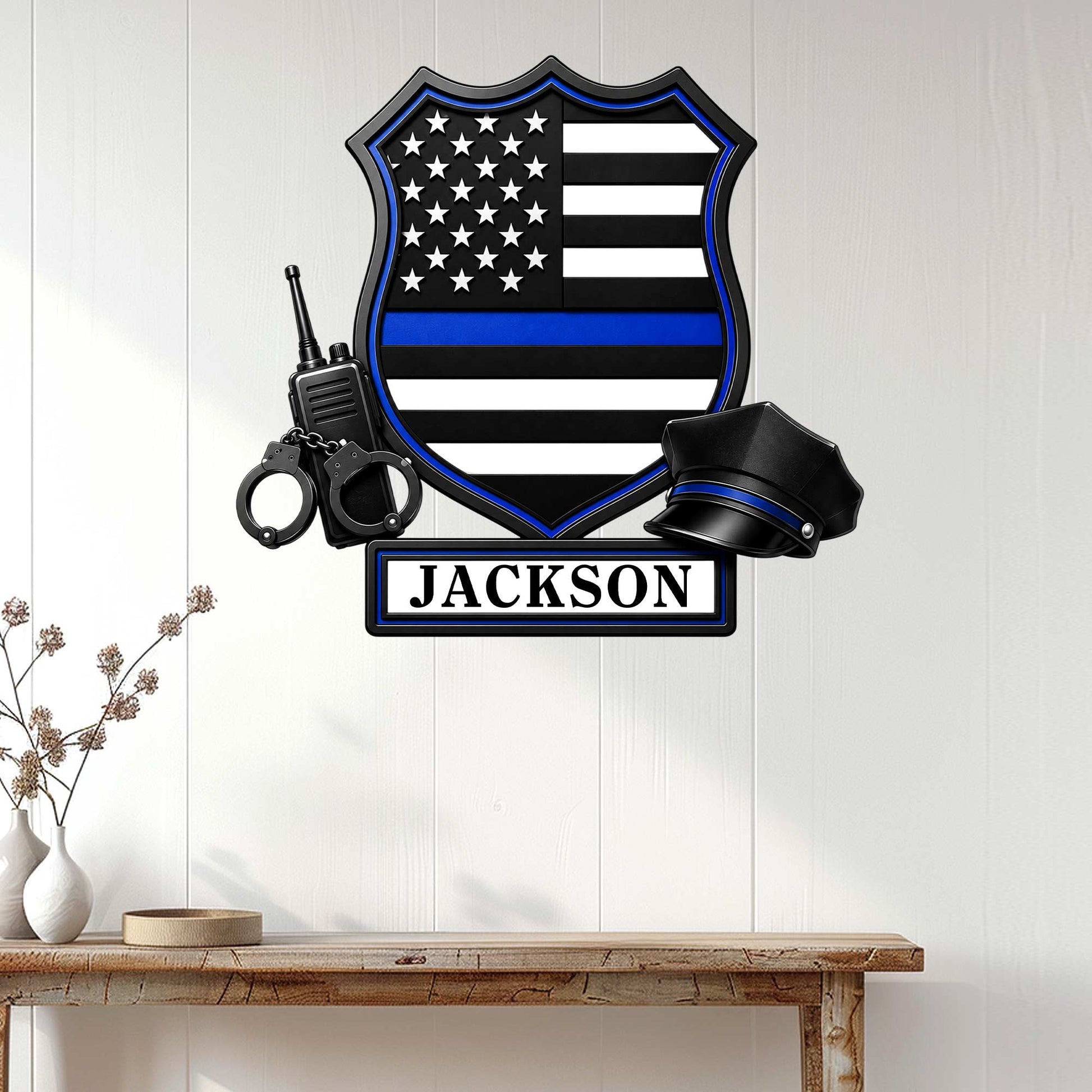 Police wall decor displayed on a light wood wall, featuring a blue line flag shield and law enforcement symbols