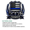 Police metal sign featuring a bold thin blue line shield design with law enforcement symbols
