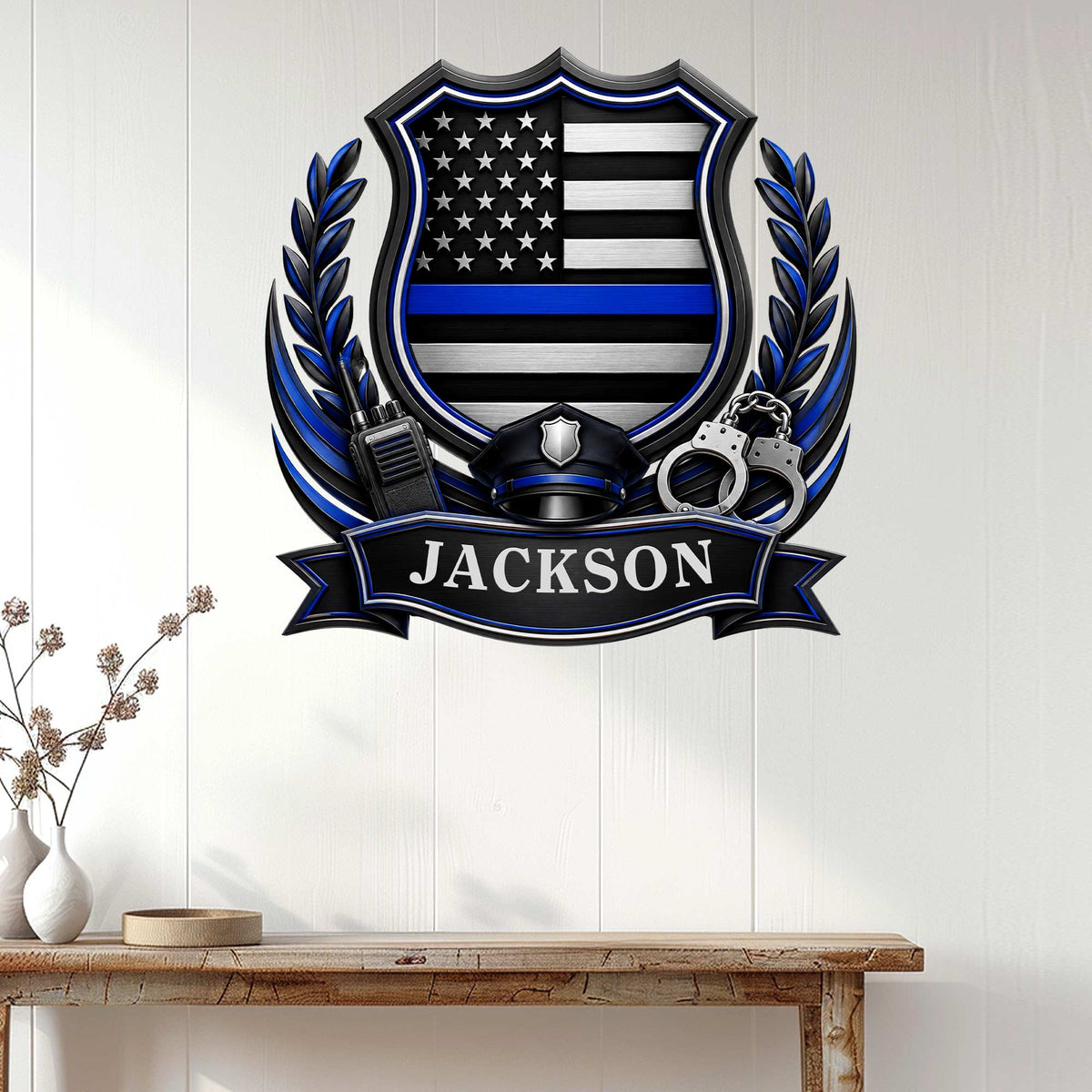 Thin blue line police wall sign displayed on a white paneled wall above a console table