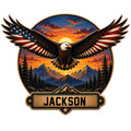 Patriotic eagle metal sign with spread wings, mountain landscape, sunset, pine trees, and American flag colors