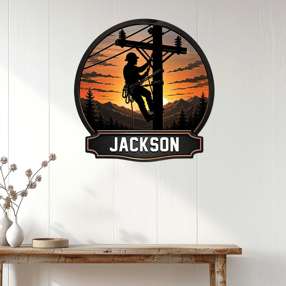 Lineman wall sign displayed in a bright home interior with a utility pole silhouette design