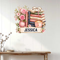 Floral book lover metal sign displayed as cozy wall decor above a console table