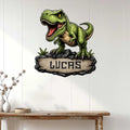 Green T-Rex dinosaur metal sign displayed on a light wood-paneled wall in a home