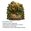 Cut metal dinosaur sign featuring a detailed roaring T. rex emerging from a tropical jungle scene