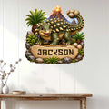 Ankylosaurus dinosaur metal wall sign displayed above a console table in a bright home interior