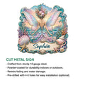 Fairy metal sign product presentation showing a winged sea fairy with colorful coral, shells, and ocean-inspired details