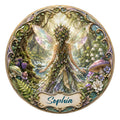 Ornate fairy metal sign featuring a winged forest fairy surrounded by flowers, mushrooms, and woodland scenery
