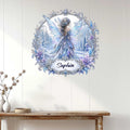 Winter fairy wall sign displayed on a light wood-paneled wall above a console table