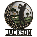 Detailed golfer silhouette metal sign showing a swing over a golf course with trees, flag, and decorative circular border