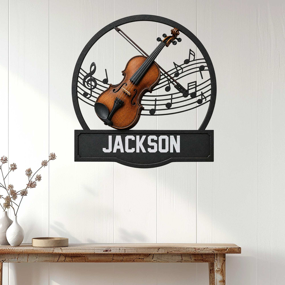 Violin wall decor displayed on a light wood-paneled wall above a console table