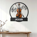 Violin music wall sign displayed on white wood paneling above a console table