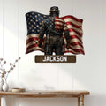 Patriotic welder metal sign displayed on a bright interior wall above a console table