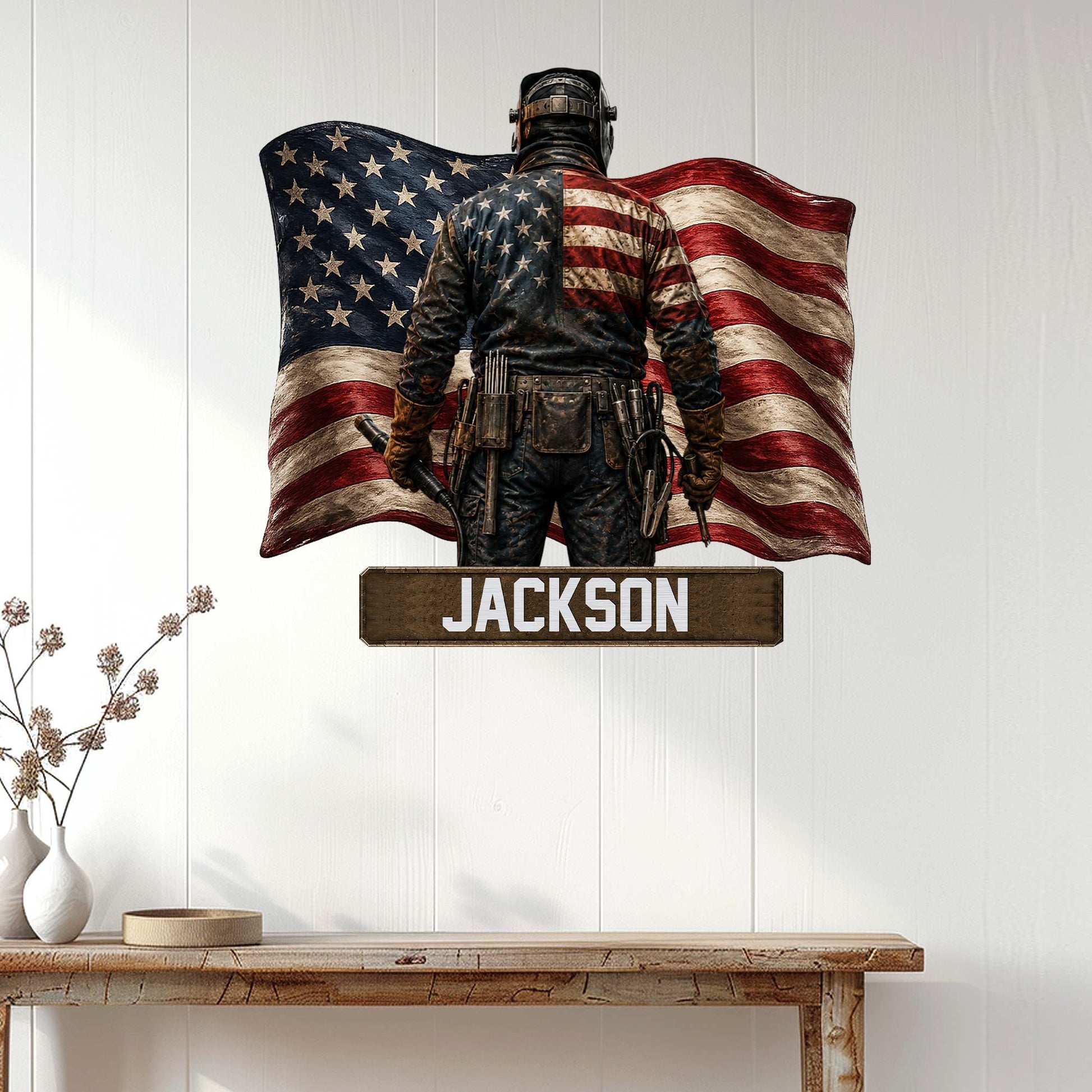 Patriotic welder metal sign displayed on a bright interior wall above a console table
