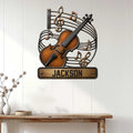 Violin wall sign displayed on a white paneled wall above a rustic console table