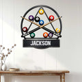 Billiards wall sign displayed on a white paneled wall above a console table in a home interior