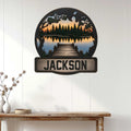 Lake cabin wall decor displayed on white paneling above a rustic console table