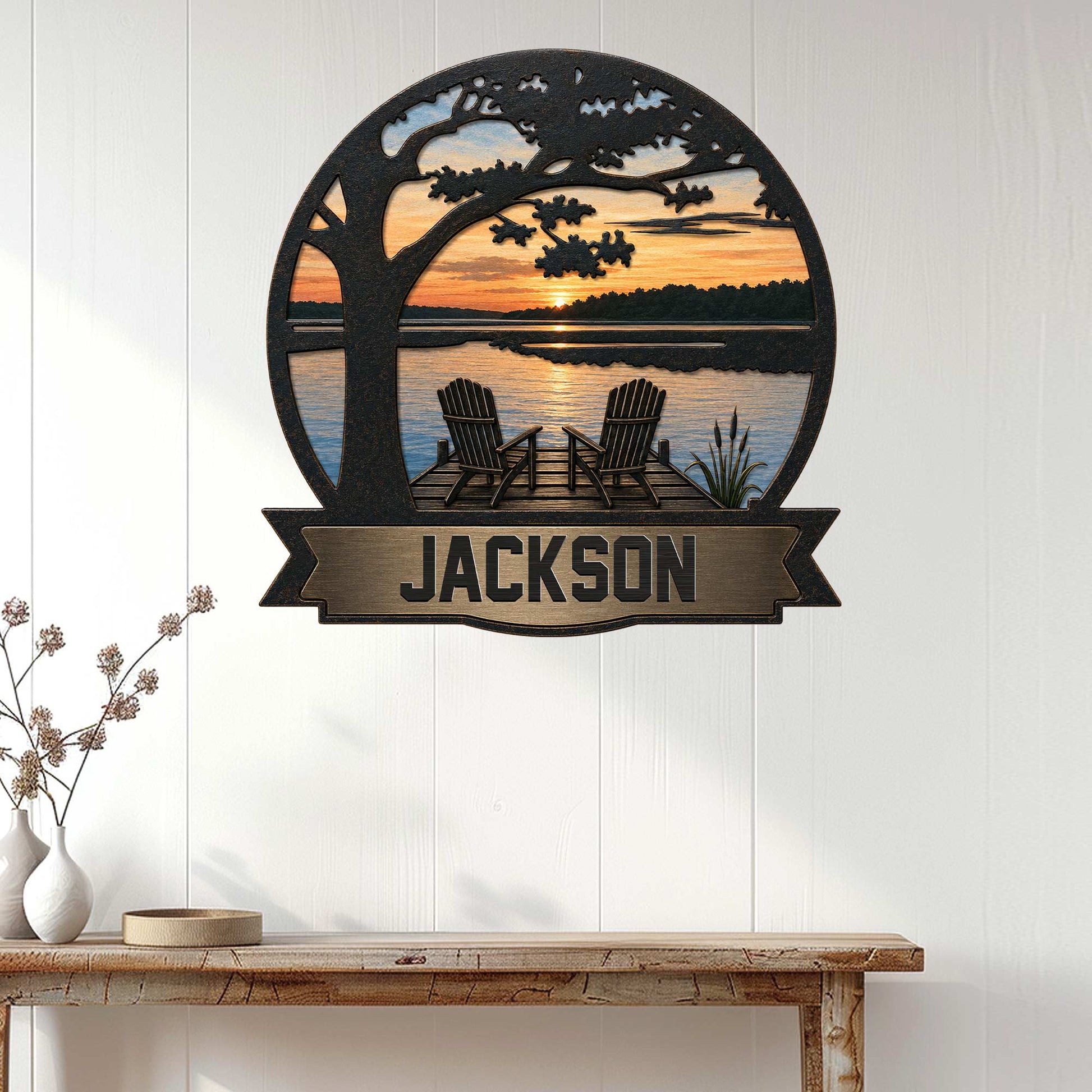 Lake house metal wall sign displayed on a white paneled wall above a rustic console table