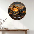 Excavator wall sign displayed on white paneled decor, featuring a tracked machine and sunset landscape