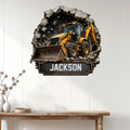 Construction backhoe metal sign displayed on a white paneled wall in a modern home setting