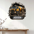 Construction wall decor featuring a yellow cement mixer truck displayed in a bright home interior