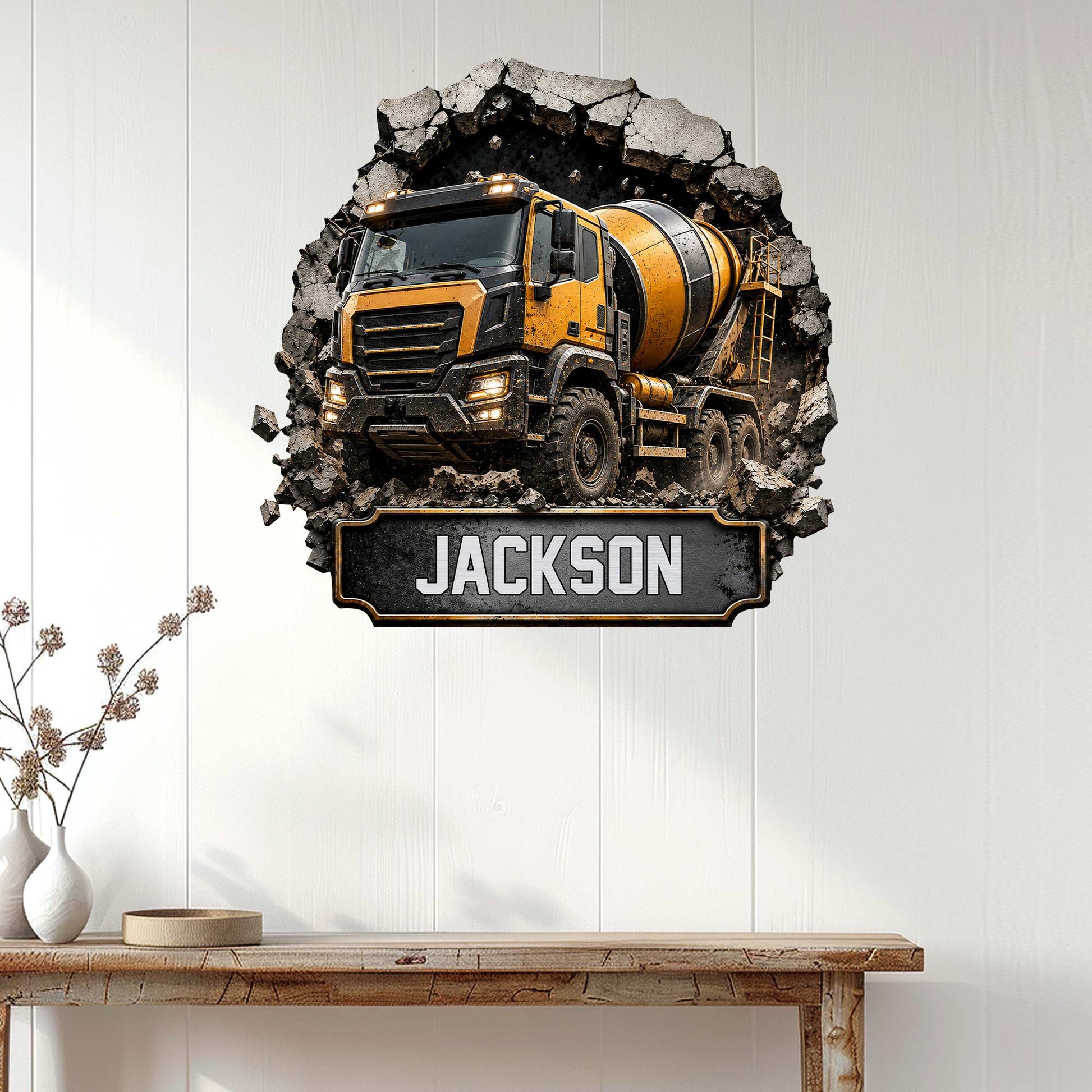 Construction wall decor featuring a yellow cement mixer truck displayed in a bright home interior