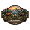 Custom deer family metal sign featuring a buck, doe, and fawn beside a mountain lake and evergreen forest