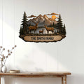 Deer family wall sign displayed above a console table in a bright rustic home