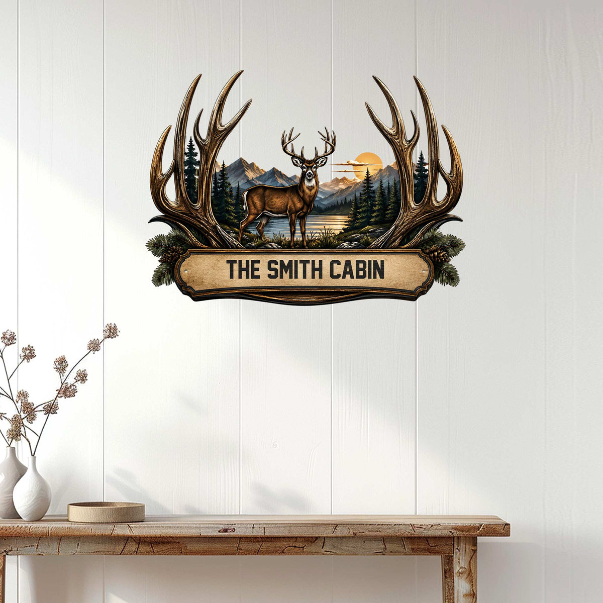 Rustic deer metal sign displayed on a light wood wall, creating a welcoming cabin-inspired focal point.