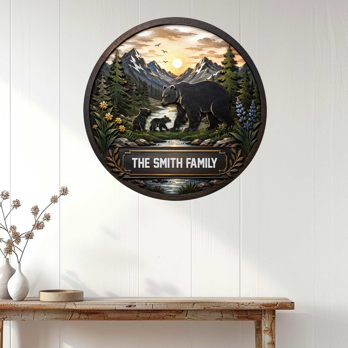 Custom bear family wall sign displayed on a white paneled wall above a console table